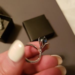 Silver iris ring navy blue stone